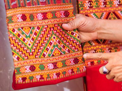 Colorful of native thai style silk and textiles pattern. Beautiful handmade woven fabrics thai silk fabric textured, with different native style patterns.