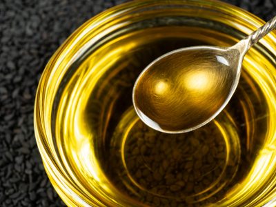 Unrefined cold pressed sesame oil in a glass bowl